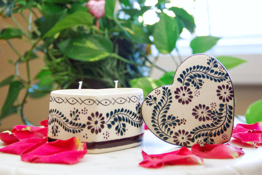 Artisanal candle in a beautiful heart shaped talavera. Handmade brown floral design with a lid. Handcrafted by Artisan in Mexico City. 100% All Natural Soy Candle. Reuse the talavera as home decor or storage.