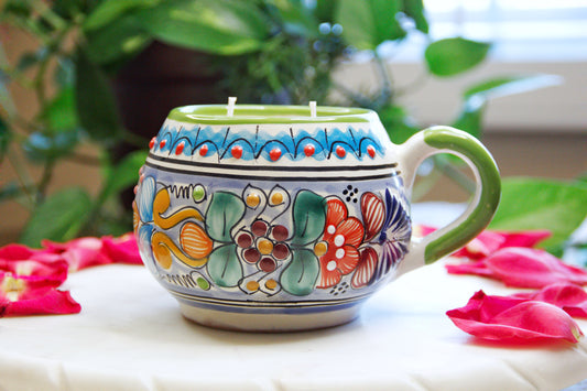 Artisanal candle in a beautiful multicolored talavera cup with a handle. Handcrafted by Artisan in Puebla, Mexico. 100% All Natural Soy Candle. Reuse the talavera as home decor or storage.