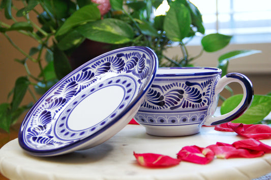 Artisanal candle in a beautiful blue and white hand designed talavera cup and plate. Handcrafted by Artisan in Puebla, Mexico. 100% All Natural Soy Candle. Reuse the talavera as home decor or storage.
