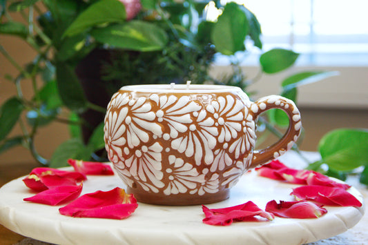 Artisanal candle in a beautiful brown cup with handle, handmade white paint strokes design. Handcrafted by Artisan in Puebla, Mexico. 100% All Natural Soy Candle. Reuse the talavera as home decor or storage.
