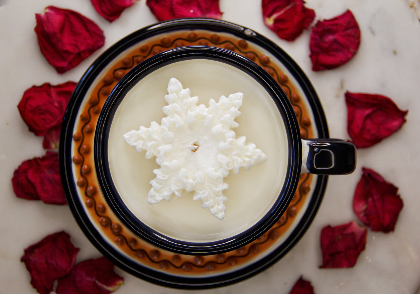 Artisanal candle with an elegant star shaped soy wax candle on the top in a beautiful multicolored talavera cup and plate. Handcrafted by Artisan in Puebla, Mexico. 100% All Natural Soy Candle. Reuse the talavera as home decor or storage.