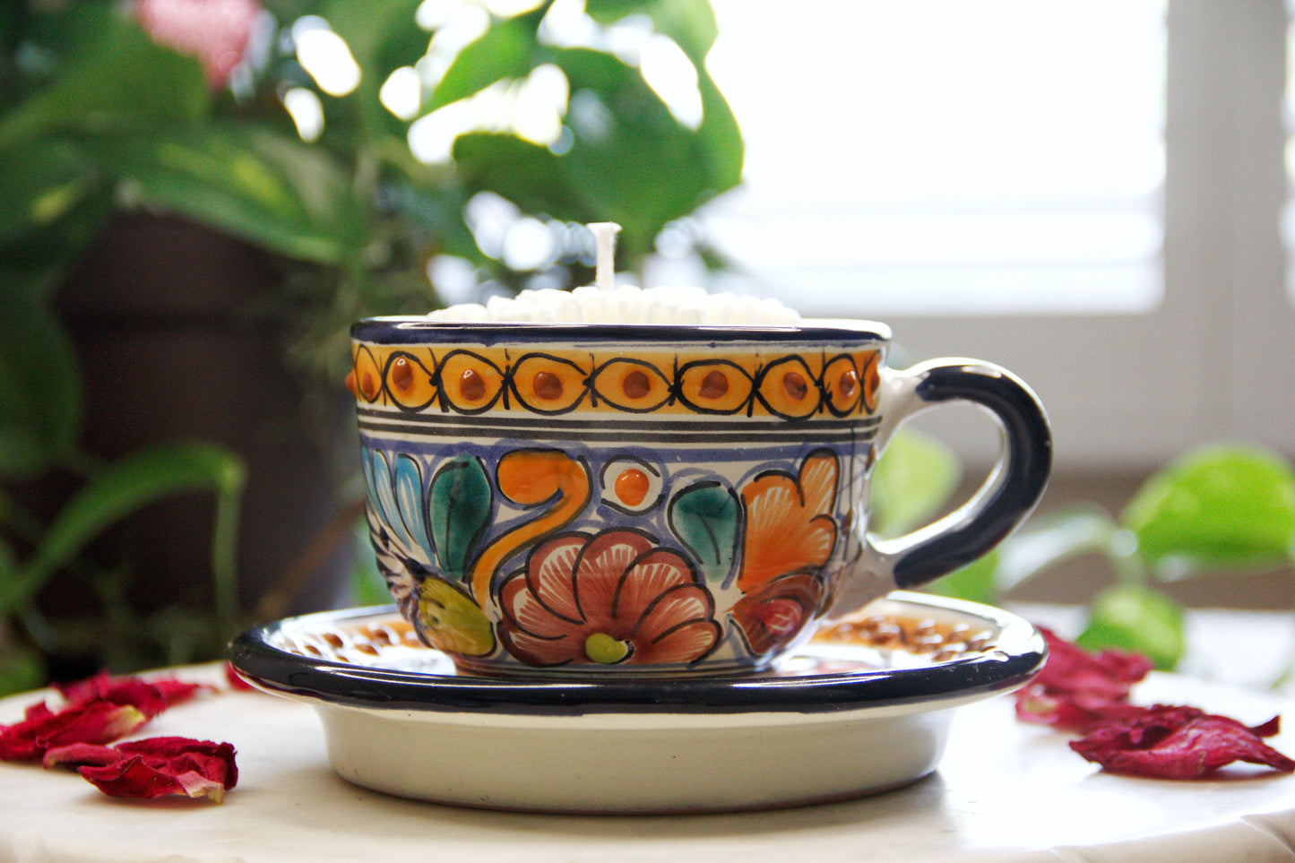 Artisanal candle in a beautiful multicolored talavera cup and plate. Handcrafted by Artisan in Puebla, Mexico. 100% All Natural Soy Candle. Reuse the talavera as home decor or storage.