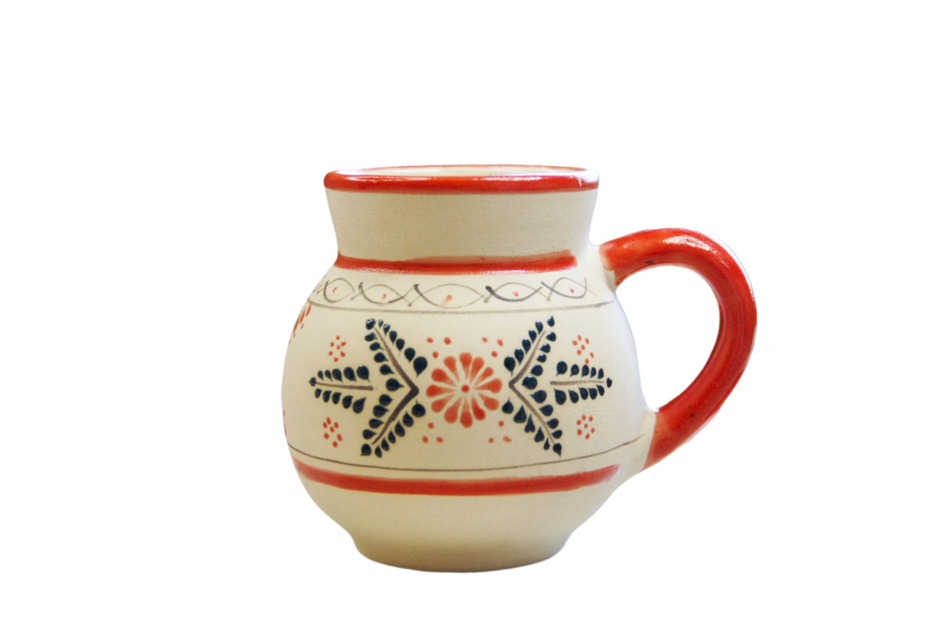 handmade artisanal candle in a red floral design mug with a handle. Custom made by Artisan in Mexico. 100% All Natural Soy Candle. Reuse the talavera as home decor or storage